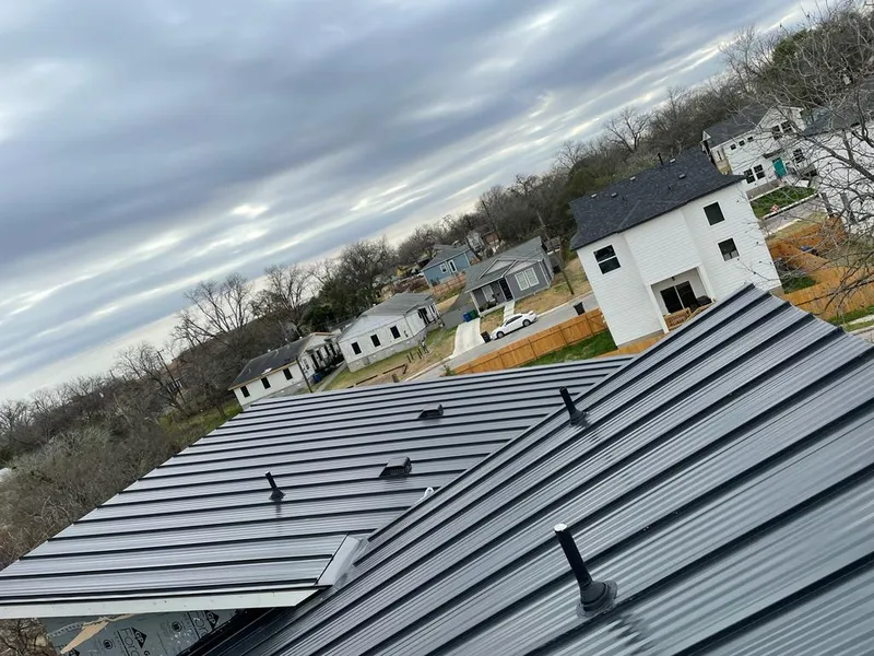 Standing seam metal roof panels with vents for Skylight Repair in Pittsfield